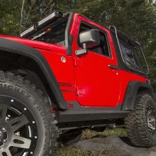 Rugged-Ridge-XHD-Rock-Sliders-Installed-2-Door-High-Res.webp