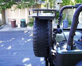 The cargo rack fits over a 36" tire with ease.  