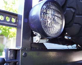 Auxiliary lights can be mounted directly to the swing out.