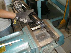 A large vise works great for installing the bar pins.